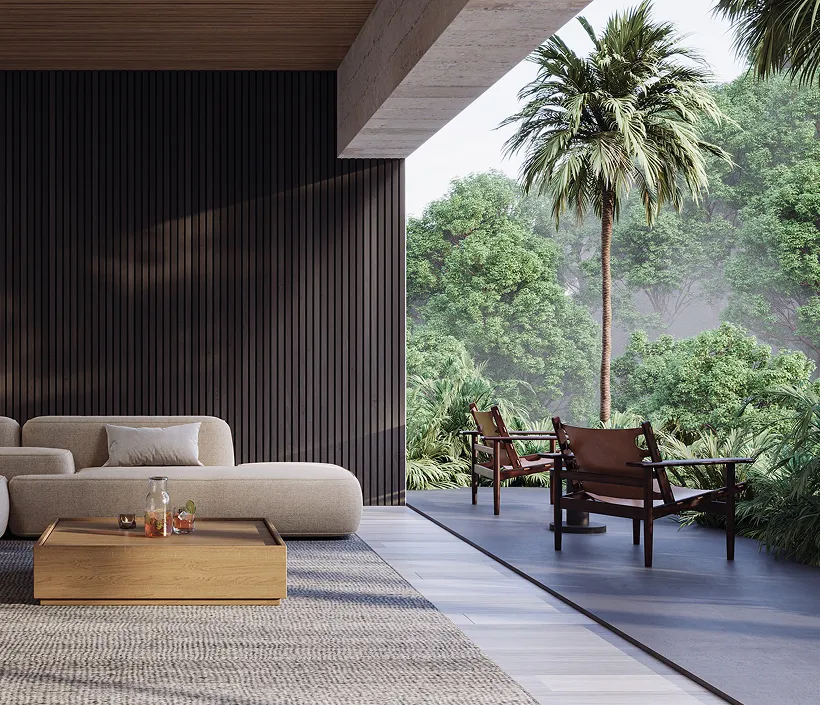 Villa terrace with a lounge sofa and leather chairs opening onto tropical palms