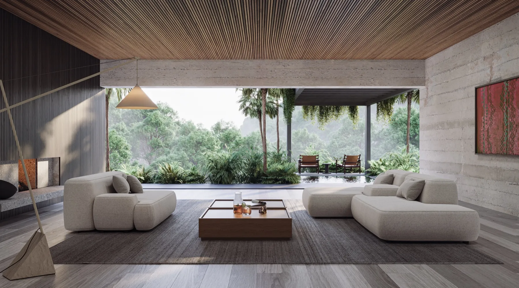 Open lounge with low sofas and a timber ceiling opening onto tropical gardens